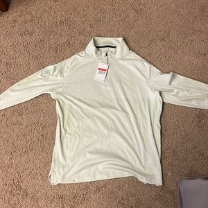 Brand new Never worn Nike Golf Pullover. Custom Cowboys Logo on Sleeve